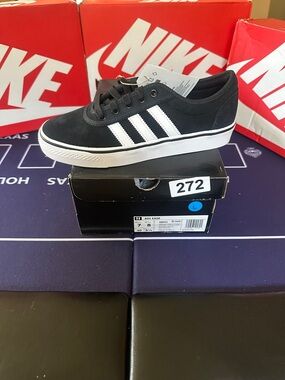 adidas Black Low-Top Skate Sneaker with White Stripes